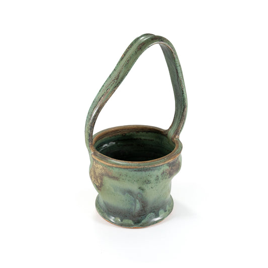 Handmade green glazed ceramic basket