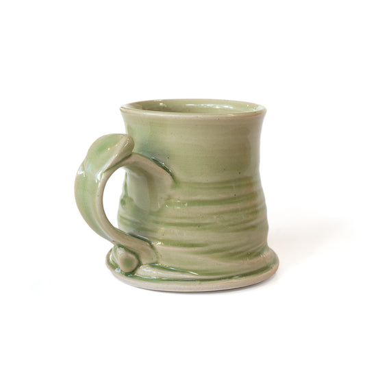 Handmade light green glazed ceramic mug